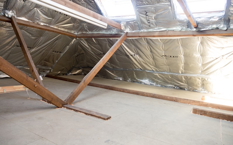 Properly installed attic insulation improving home energy efficiency
